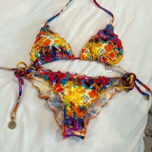 Luli fama colorful swim suit